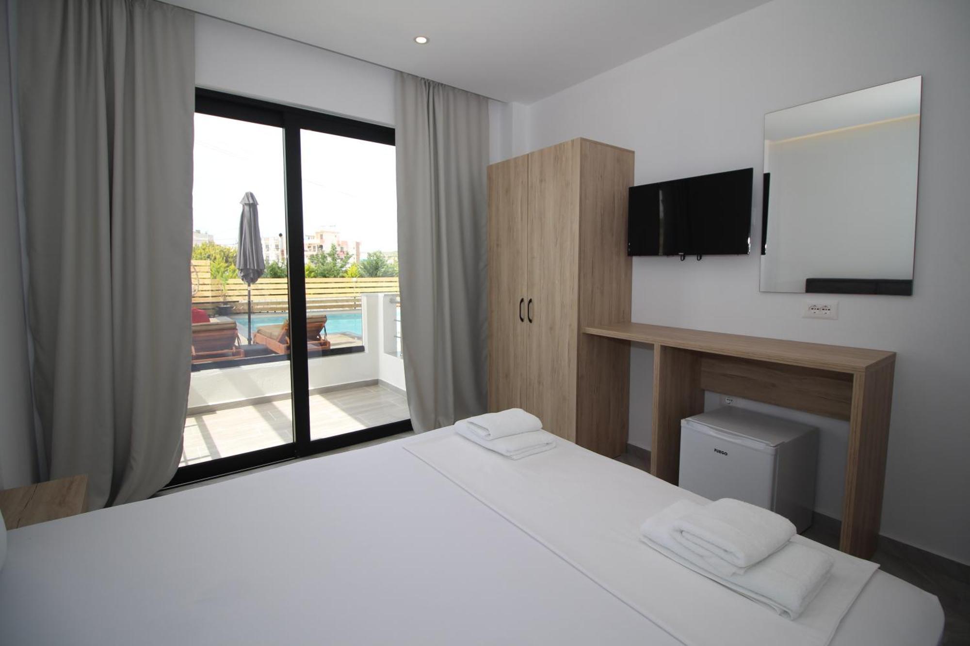 Noa Boutique Hotel Ksamil Habitación foto